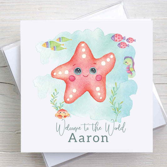 Welcome to the World baby card with starfish, under the sea design.  Wording reads Welcome to the World and features baby's name.